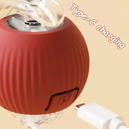 PurrPlay™ Interactive Rolling Ball Toy with Faux Tail — Rechargeable & Smart